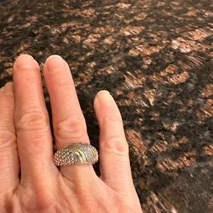 Sterling silver and gold band with small chips.